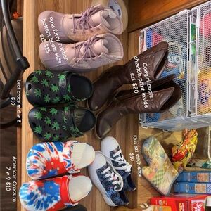 Various kids and woman’s shoes